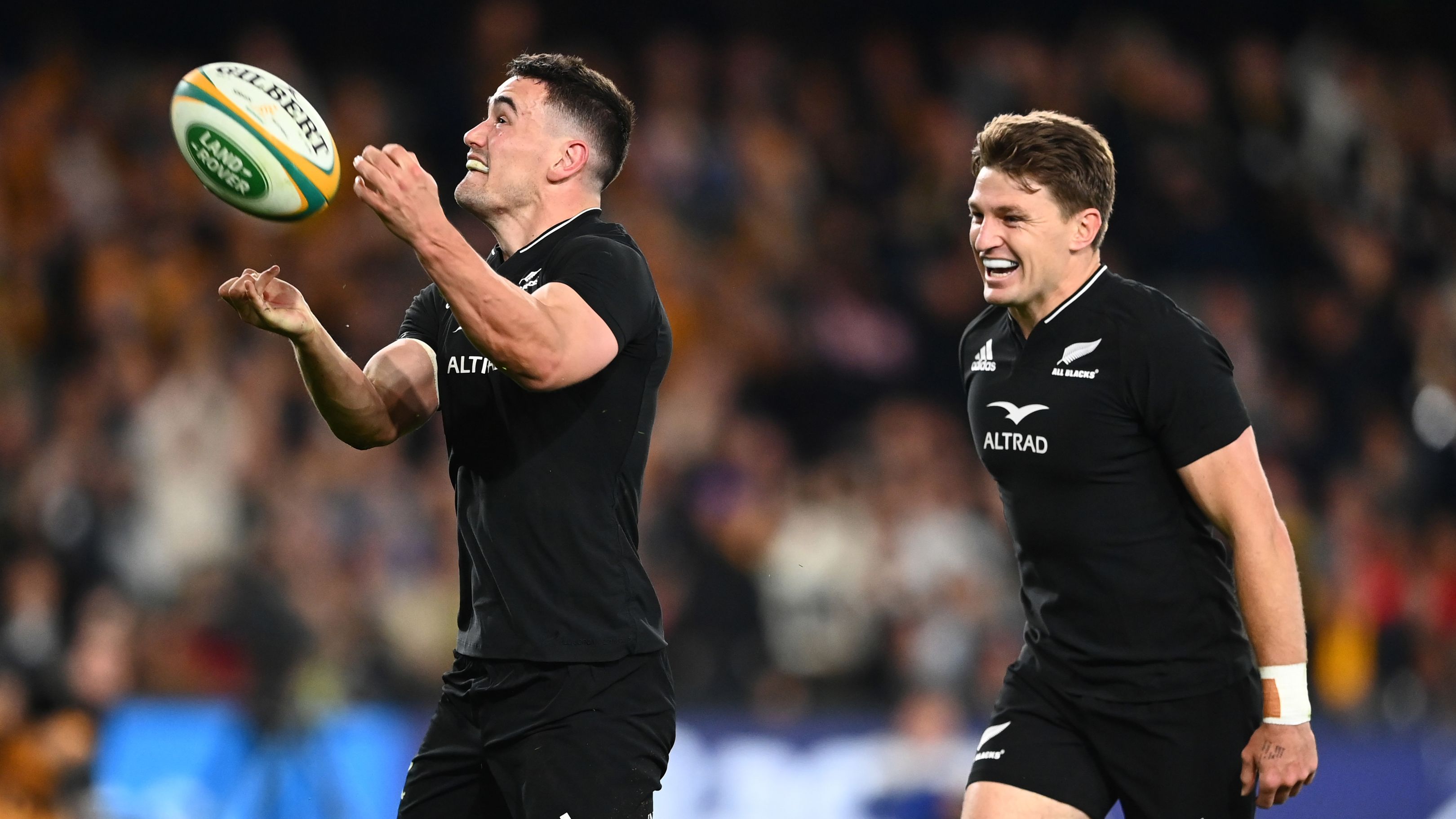 Will Jordan of the All Blacks celebrates after scoring a try with Beauden Barrett.