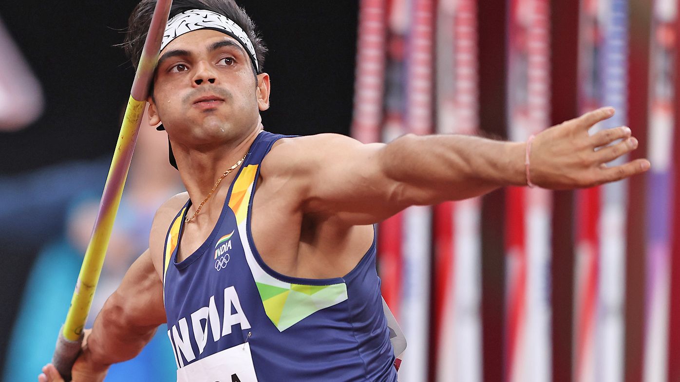 Neeraj Chopra from India rejoices over gold.