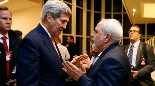 ecretary of State John Kerry talks with Iranian Foreign Minister Mohammad Javad Zarif in Vienna after brokering the Iran nuclear deal. (AAP)