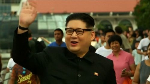 Australian man Howard turns heads dressed as Kim Jong-un in Singapore. Picture: 9NEWS