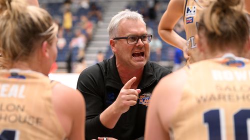 Sydney Flames head coach Shane Heal talks to players. (Photo by Morgan Hancock/Getty Images)