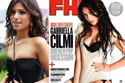 Aussie singer Gabriella Cilmi was surprised to find she'd been given a "free boob job" when she posed for <i>FHM</i>.