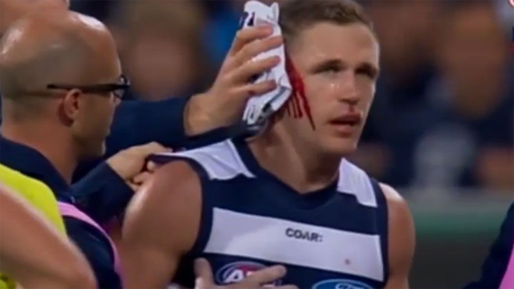Geelong skipper Joel Selwood cops stray elbow to the head in victory over Adelaide Crows