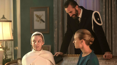Joseph Fiennes as Commander Fred Waterford, with Yvonne Strahovski as Serena Joy and Sydney Sweeney as Eden Spencer shooting a scene for the TV series.