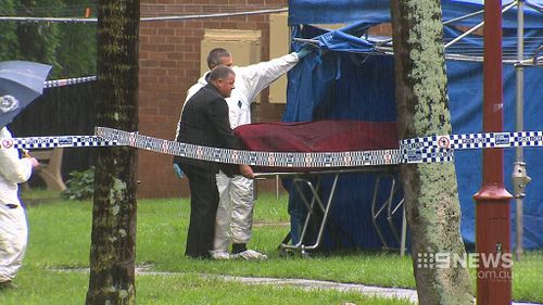 Two more men charged over body found in surfboard bag at Wollongong unit block in April