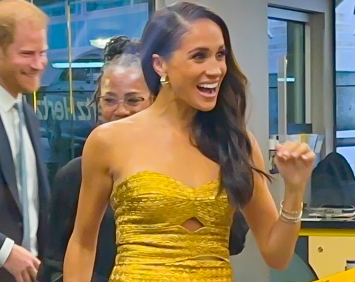 Meghan, Duchess of Sussex, attends Women in Vision Awards in glam gold dress  with Prince Harry, Doria Ragland - 9Honey