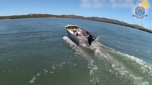 The unmanned tinny runs loose after the fisherman was knocked out of the vessel from another boat's wake.