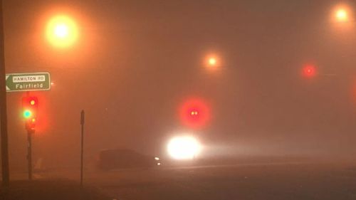 Fog blankets the road in Fairfield in Sydney's west. (9NEWS)