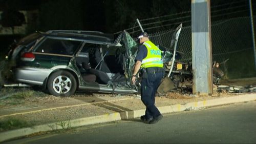 Woman dies after car smashes into power pole in Adelaide 