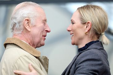 King Charles III and Zara Tindall hug as as they greet each other at the Endurance event on day 3 of the Royal Windsor Horse Show at Windsor Castle on May 03, 2024 in Windsor, England. 