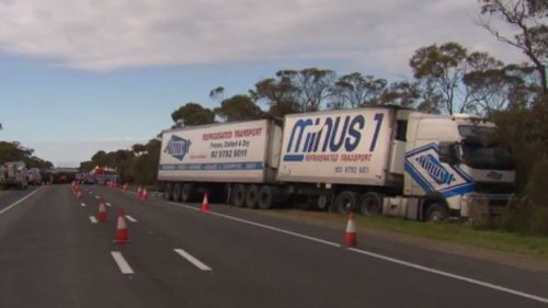 The two semi-trailers were travelling in opposite directions. (9NEWS)