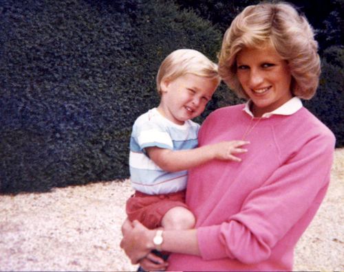 Princess Diana holds Prince William while pregnant with Prince Harry. (Kensington Palace)