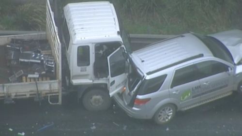 Two trucks collided with five cars. (9NEWS)