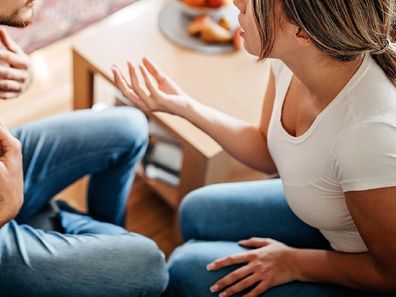 Couple fight living room at home