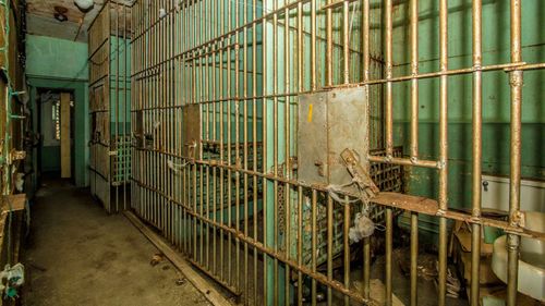 The original prison cells with barred windows and the jailer's office remain.