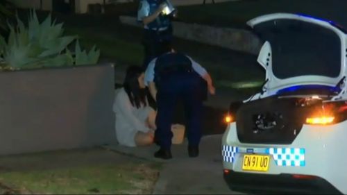 A woman kicked an intruder down the stairs of her home in Sydney's inner west this morning.