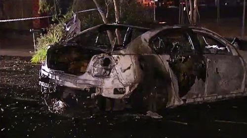 A car believed to have been used in the drive-by shooting was found burnt out nearby. (9NEWS)