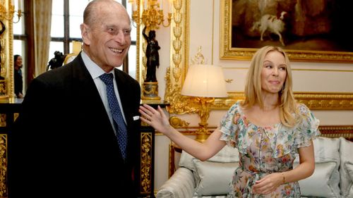 The pair share a laugh after the ceremony at Windsor Castle. (AAP)