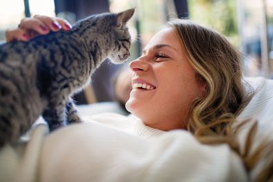 Woman with pet cat