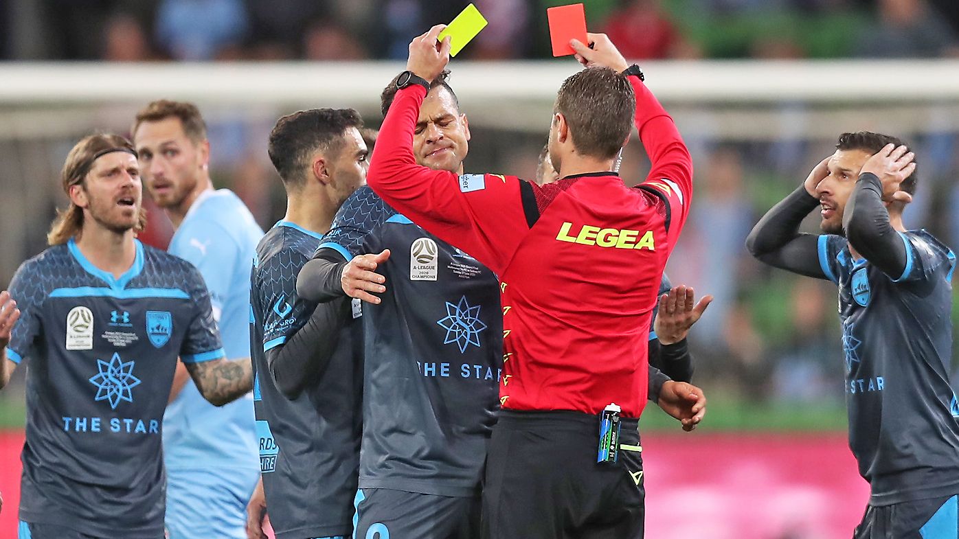 Luke Brattan of Sydney FC is given a red card during the A-League Grand Final