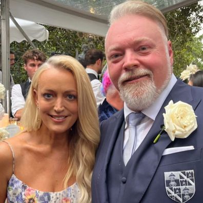 Jackie Henderson and her Kyle & Jackie O radio co-star Kyle Sandilands pose together at his wedding 