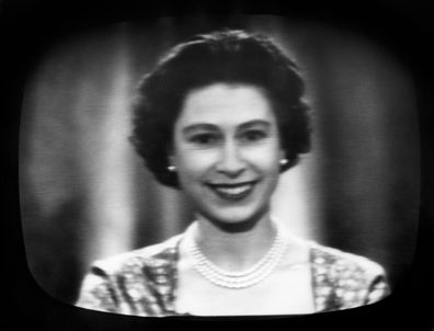 The warm, friendly smile of the Queen seen in close-up on a television screen as she concludes her traditional Christmas day broadcast to her people, which was televised this year for the first time and carried by both the BBC and ITV. The Queen ended her message: 'I hope that 1958 may bring you God's blessing and all the things you long for. And so I wish you all, young and old, wherever you may be, all the fun and enjoyment and the peace of a very happy Christmas'. She was speaking from the Lo