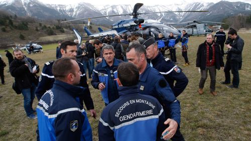 Rescue workers and gendarme gather in Seyne-les-Alpes. (AAP)