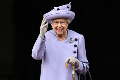 Queen Elizabeth II (C) attends an Armed Forces Act of Loyalty Parade at the Palace of Holyroodhouse on June 28, 2022 in Edinburgh, United Kingdom. 