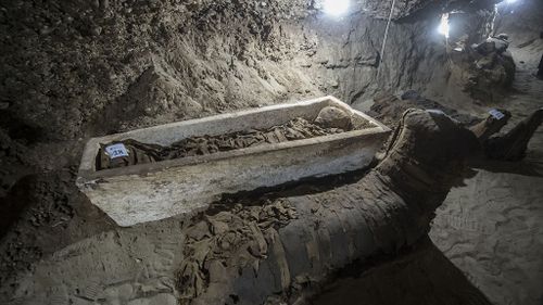Archaeologists found the non-royal mummies in a series of corridors after following the trail of burial shafts. (AFP)