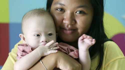 Thai surrogate mother Pattaramon Chanbua with baby Gammy. (AAP)