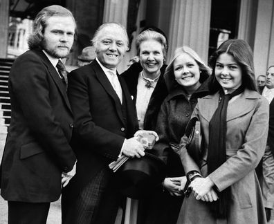 Sir Richard Attenborough with his wife Sheila Sim and chidren (from left) Michael, Charlotte and Jane, after his knightnhood ceremony at Buckingham Palace in 1976.