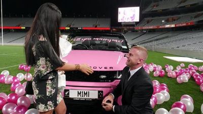 Fitness star's "insane" marriage proposal inside New Zealand stadium