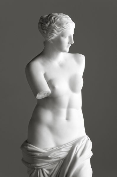 Vintage copy statue of Venus de Milo, a famous Greek sculpture dating back to about 100 BC. It is believed to depict the Greek goddess of love, Aphrodite.