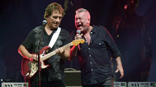MELBOURNE, AUSTRALIA - OCTOBER 25TH 2024:Ian Moss and Jimmy Barnes  of Cold Chisel perform on stage at Flemington Race Course on 25th October 2024 in Melbourne, Australia. (Photo by Martin Philbey) *****Cold Chisel
