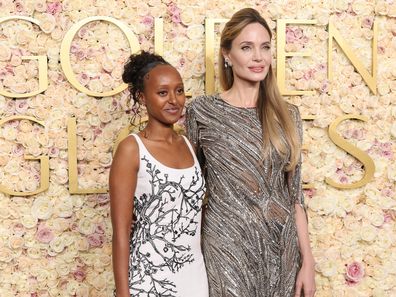 Zahara Jolie and Angelina Jolie attend the 82nd Annual Golden Globe Awards at The Beverly Hilton on January 05, 2025 in Beverly Hills, California. 