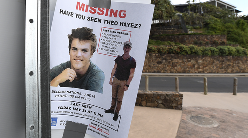 A missing persons flyer is seen near a beach as the search continues for missing backpacker Theo Hayez at Byron Bay on the far north New South Wales coast, Thursday, June 20, 2019.  (AAP Image/Dave Hunt) 