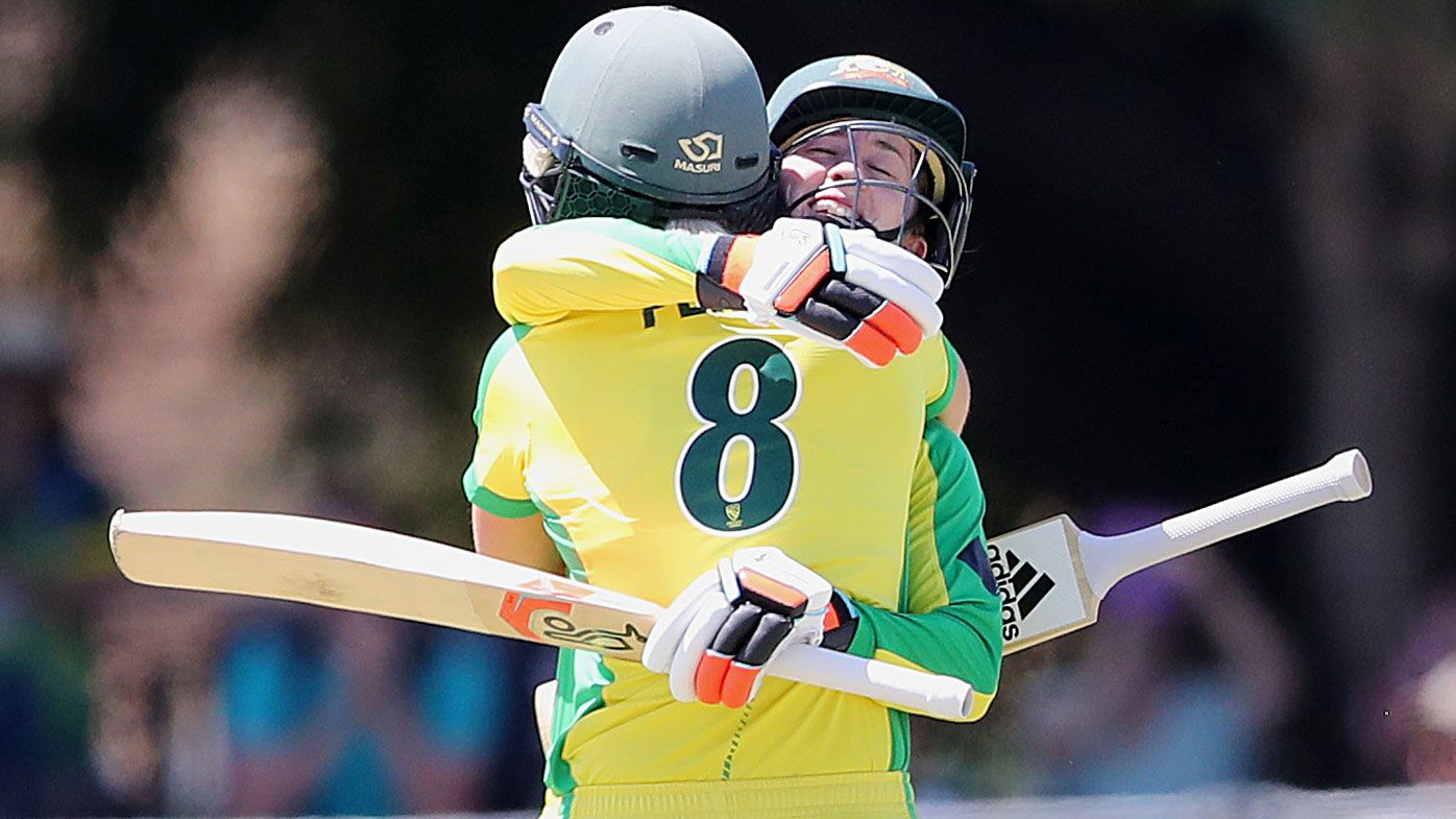 Rachael Haynes of Australia hugs team mate Ellyse Perry as she brings up 100 runs during game two of the International Women&#x27;s One Day International Series between Australia and Sri Lanka 