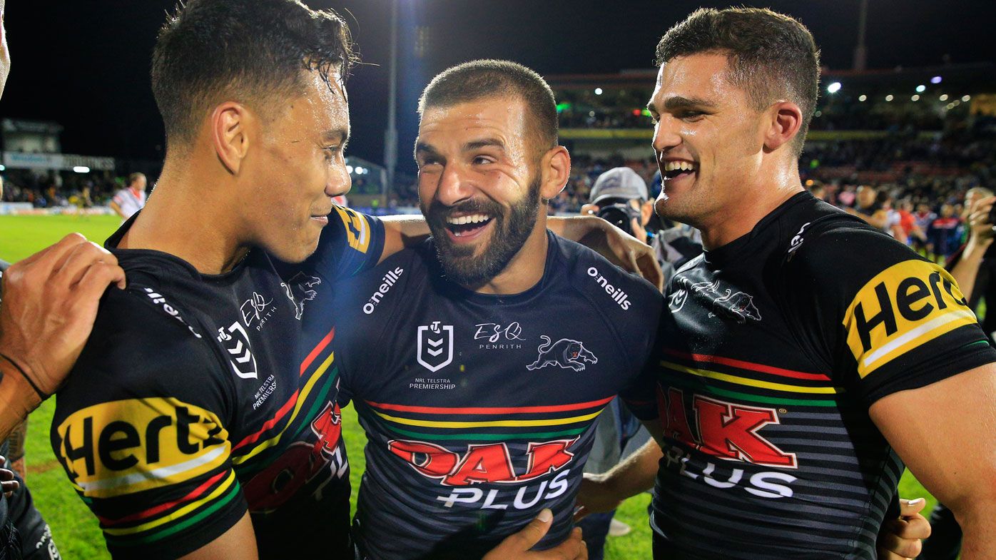 Jarome Luai, Josh Mansour and Nathan Cleary of the Panthers celebrate their win 