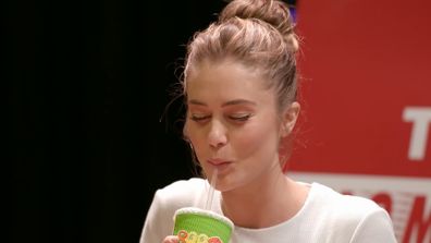 The celebrities try the smoky barbecue mango Boost Juice smoothie