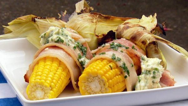 Bbq corn cobs with bacon and garlic butter