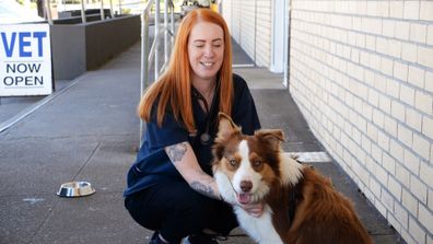 Veterinary nurse Laura Pennington with a dog