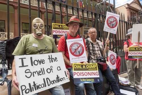 Protestors gathered outside NSW Parliament last month, calling for plans for the incinerator to be scrapped. (AAP)