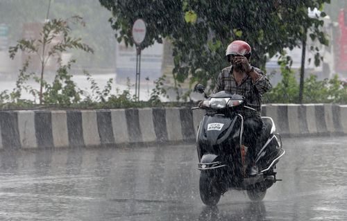 The weather department has issued warnings of heavy rainfall and gusty winds on Wednesday for Mumbai, Thane, Palghar, Raigad, Ratnagiri and Sindhudurg districts. (Photo by Satyabrata Tripathy/Hindustan Times via Getty Images)