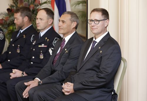 Dr Harris (right) and rescue partner Craig Challen (second from right) have already received the Order of Australia and the Star of Courage by Governor General Peter Cosgrove.