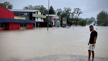 Omid Mehrzadi outside his flooded Oxley business. February 26, 2022