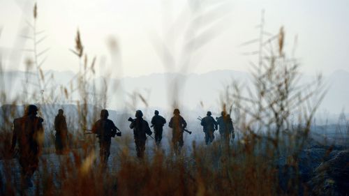 Afghan National Army troops on patrol near Siah Choy. (AFP)