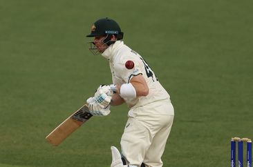 PERTH, AUSTRALIA - DECEMBER 16: Steve Smith of Australia is stuck by a delivery from Shaheen Shah Afridi of Pakistan during day three of the Men&#x27;s First Test match between Australia and Pakistan at Optus Stadium on December 16, 2023 in Perth, Australia (Photo by Paul Kane/Getty Images)