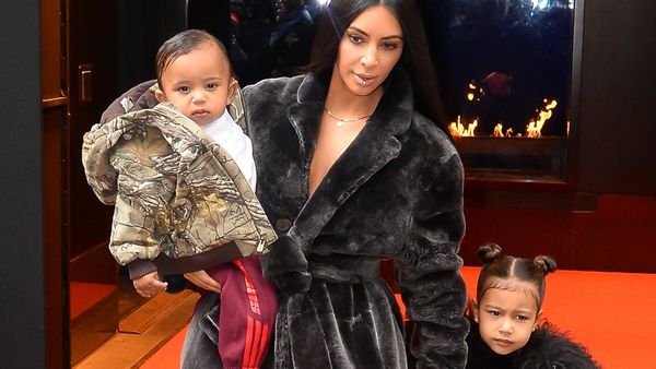 Saint West, mama Kimmy K and sister North. Out and about and staying safe too. Image: Getty.