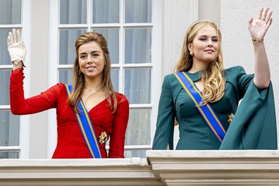 Princess Alexia of the Netherlands and Princess Amalia of the Netherlands wave to the public from the balcony of Noordeinde Palace at the end of Budget Day on September 17, 2024 in The Hague