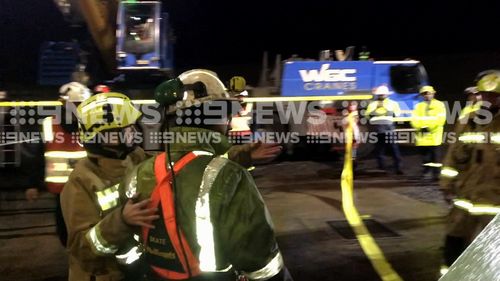 The two miners were trapped for nine hours, finally being freed about midnight last night. (9NEWS)